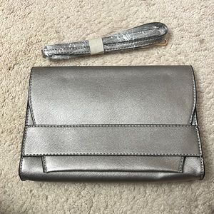 COPY - Never used clutch with strap still in wrapping